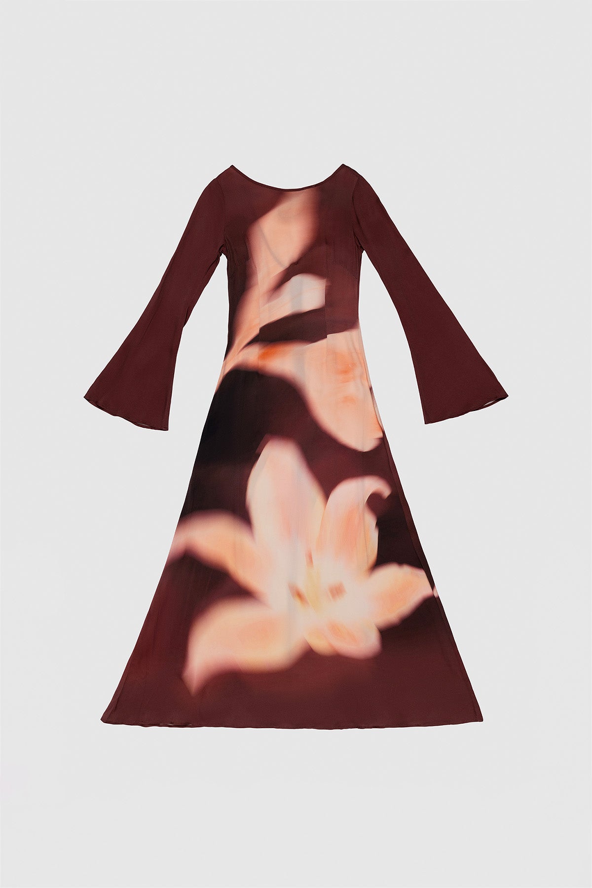 Silky sleeved maxi dress with custom floral TWG print and adjustable back tie, designed for a sleek, glamorous fit.