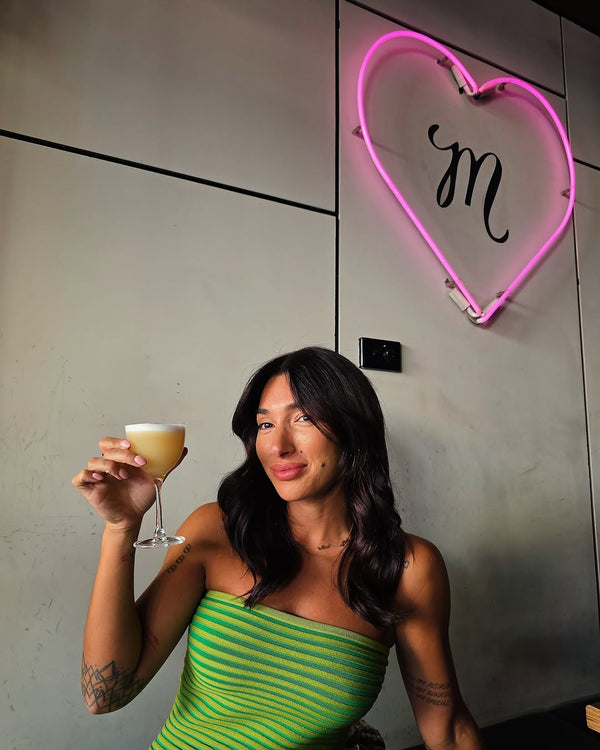Ella wears the Sunmor Knit Dress in S