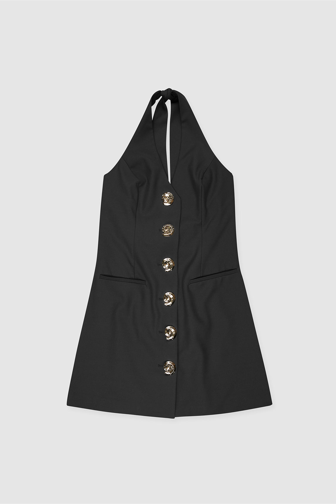 Best-selling women’s Black Irida mini halter neck vest dress with gold swirl buttons, tie-back, and front welt pocket—wear alone or with matching pants.