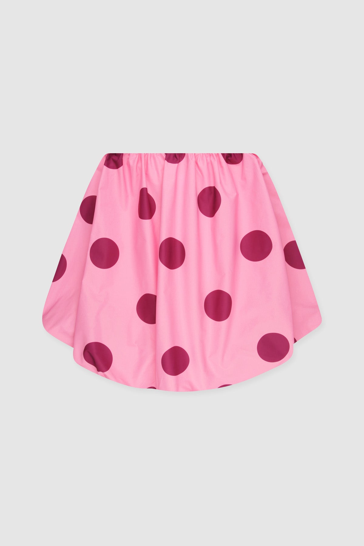 Women’s spotted mini dress with bubble hem, back zip, and internal bra support.