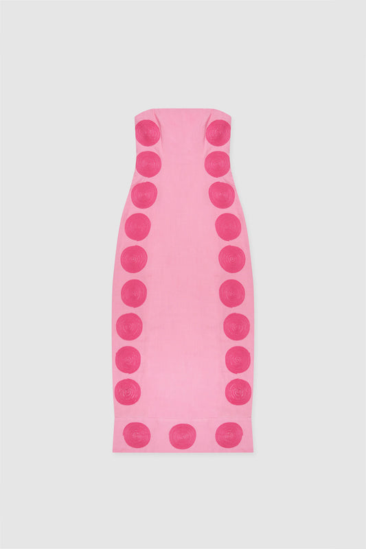 Woman wearing Pink linen cotton maxi dress with contrast embroidery and shaped bust.