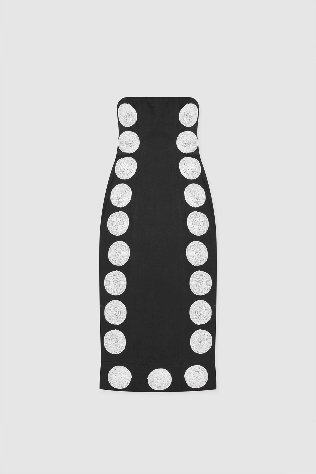 A black maxi dress with white contrast embroidery in a dotted pattern