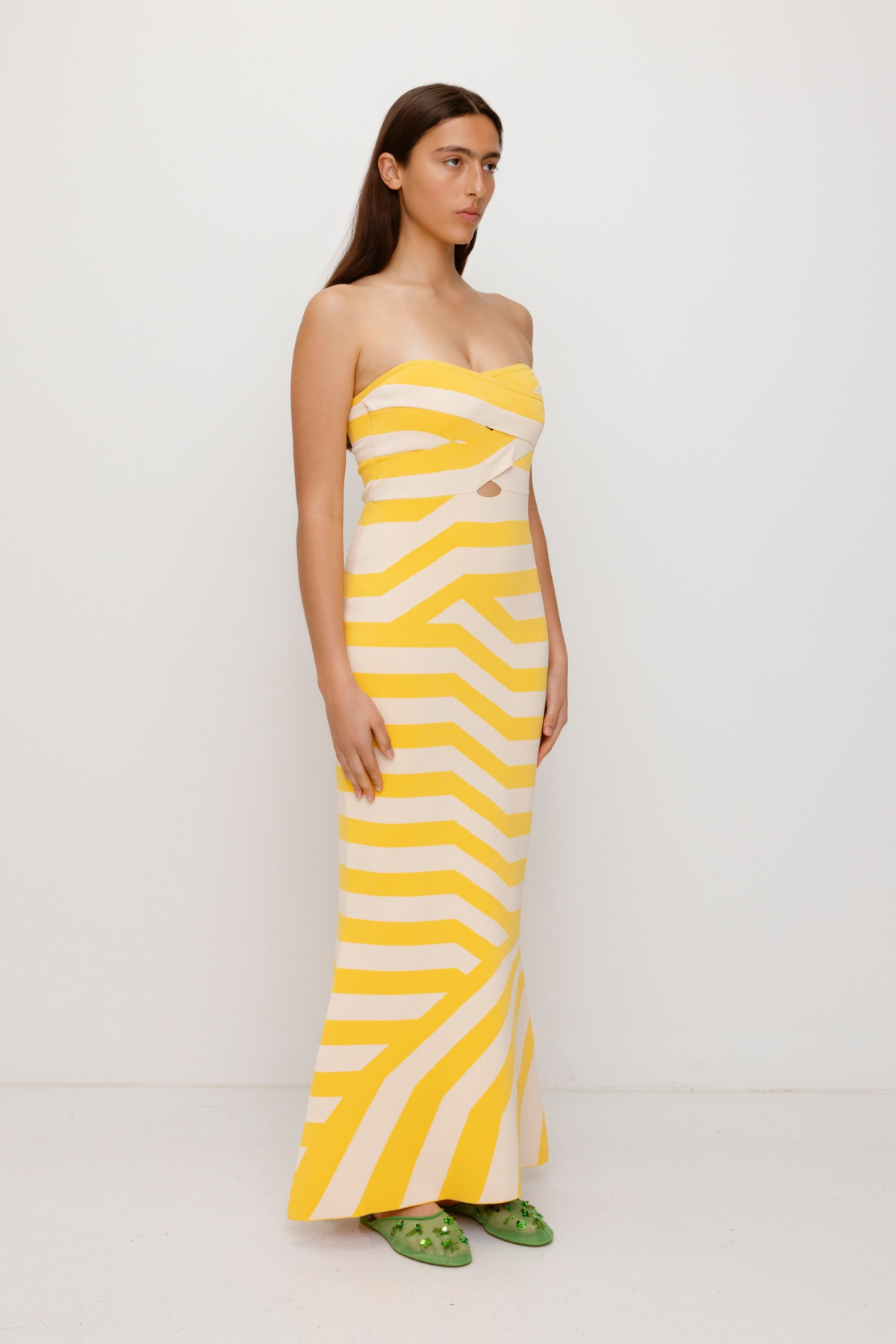 Women’s strapless Maxi Golden Aude Dress with two-tone knit in Yellow and White fitted silhouette gold back zip and flared hemline.
