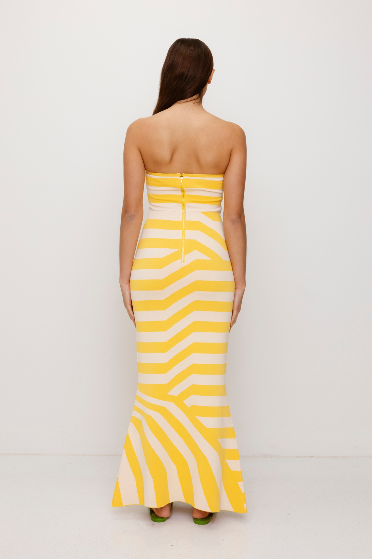 Women’s strapless Maxi Golden Aude Dress with two-tone knit in Yellow and White fitted silhouette gold back zip and flared hemline.