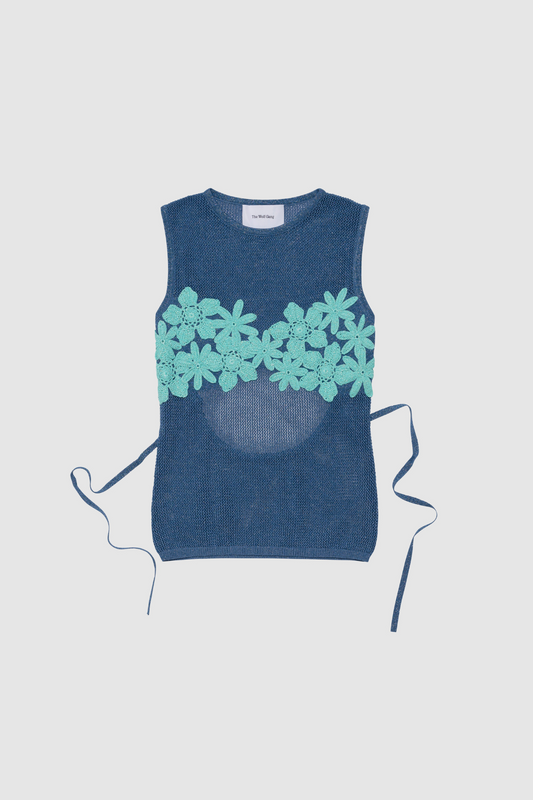 Blue stretchy knit top with 3D hand-crochet floral details and metallic lurex finish.