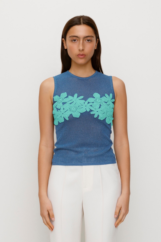 Blue stretchy knit top with 3D hand-crochet floral details and metallic lurex finish.