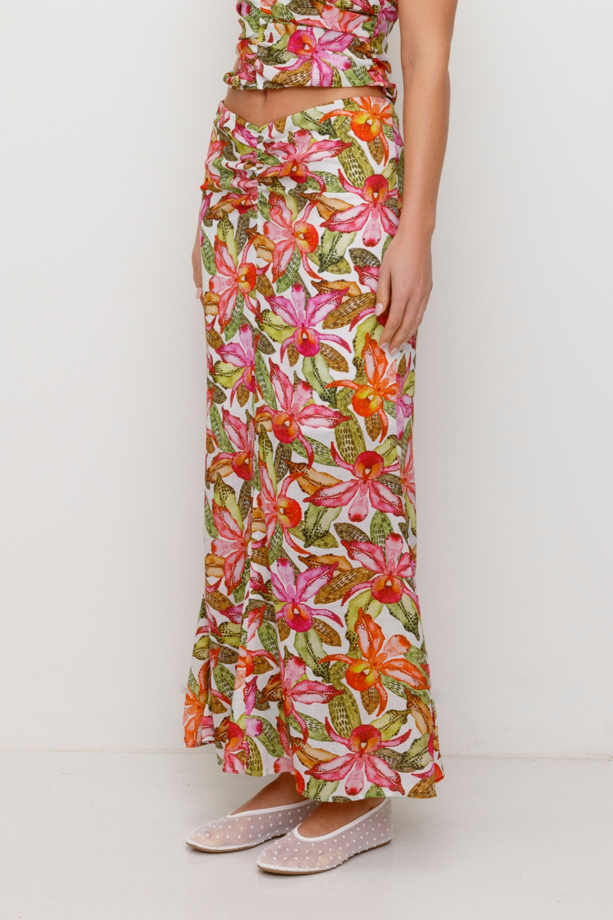 Women's Pink, multi coloured floral maxi skirt by The Wolf Gang, styled to match the ruched Catia Top for an effortless coordinated outfit.