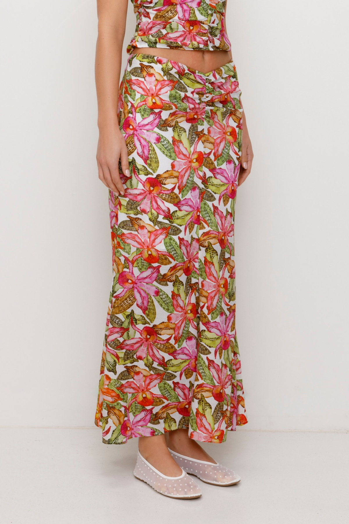 Women's Pink, multi coloured floral maxi skirt by The Wolf Gang, styled to match the ruched Catia Top for an effortless coordinated outfit.