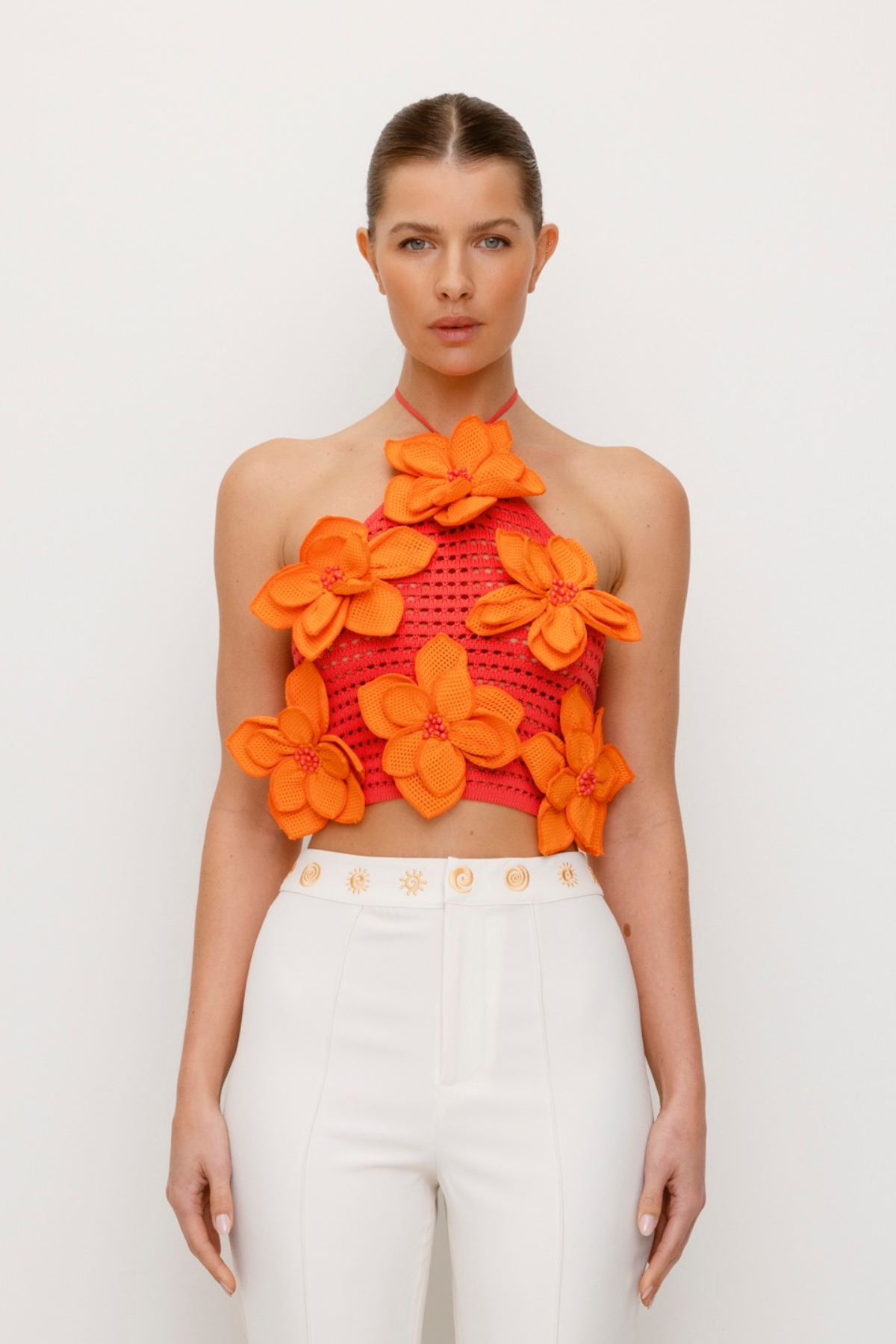 Women’s Pink & Orange La Monada Knit Top with 3D crocheted flower embellishments halter neckline open weave and full coverage body-hugging fit