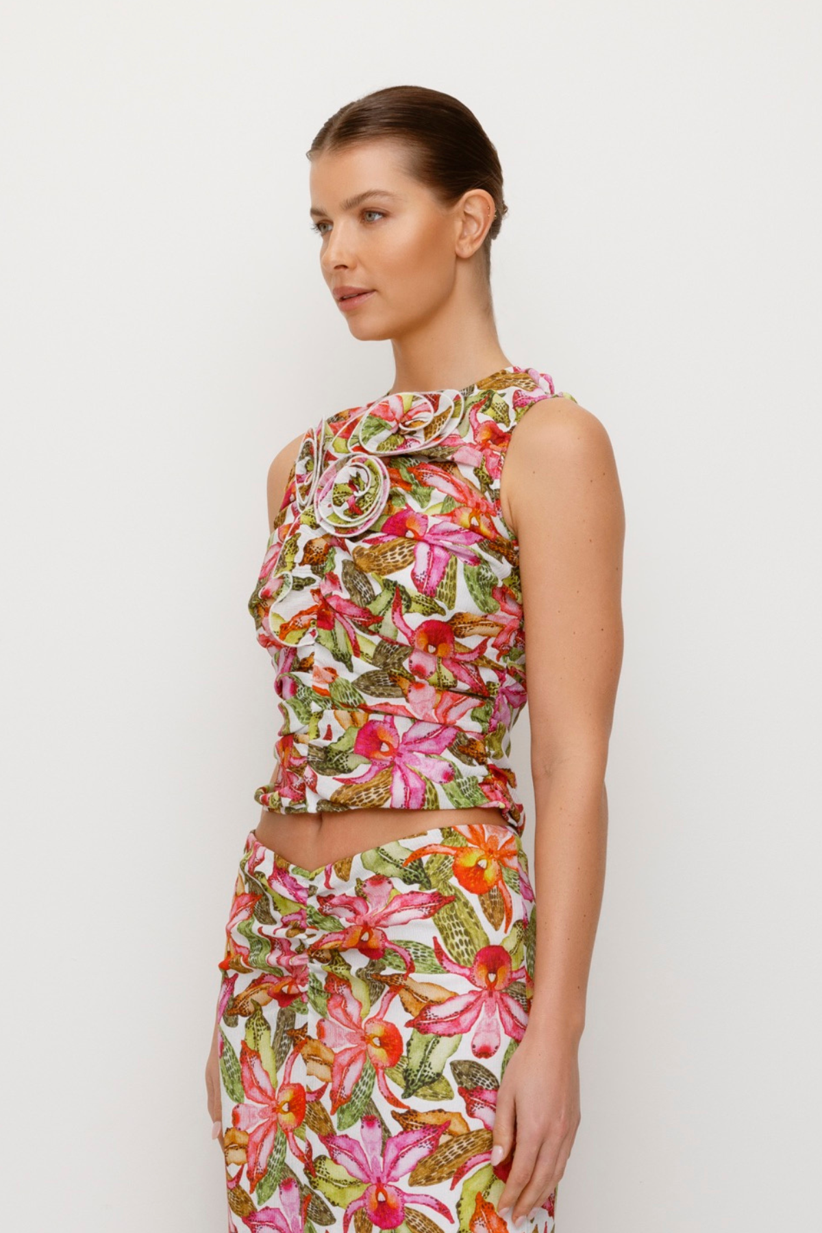 Women's ruched Pink Floral Multi coloured top with 3D floral details by The Wolf Gang, perfect with jeans or matching skirt.