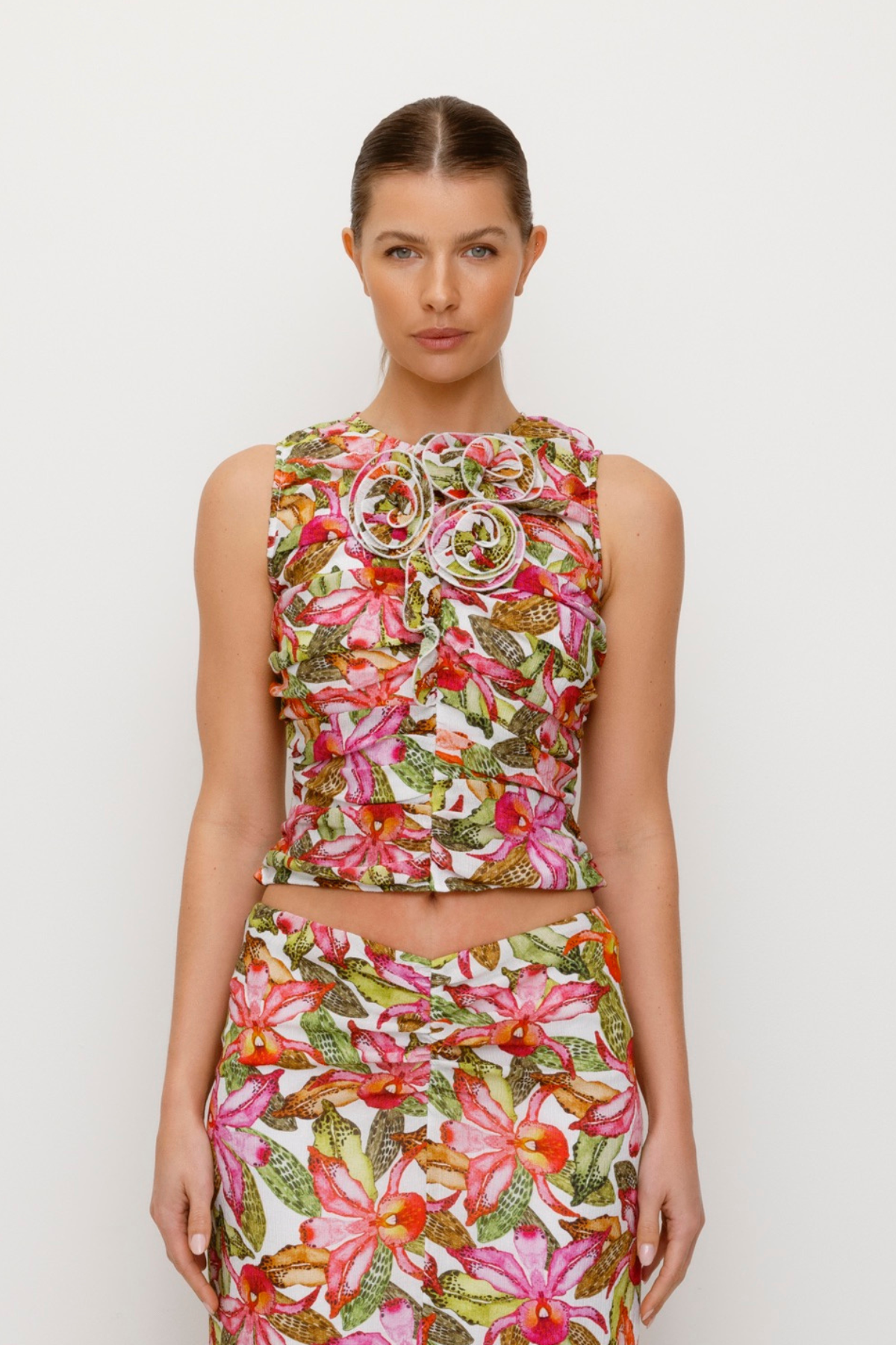 Women's ruched Pink Floral Multi coloured top with 3D floral details by The Wolf Gang, perfect with jeans or matching skirt.