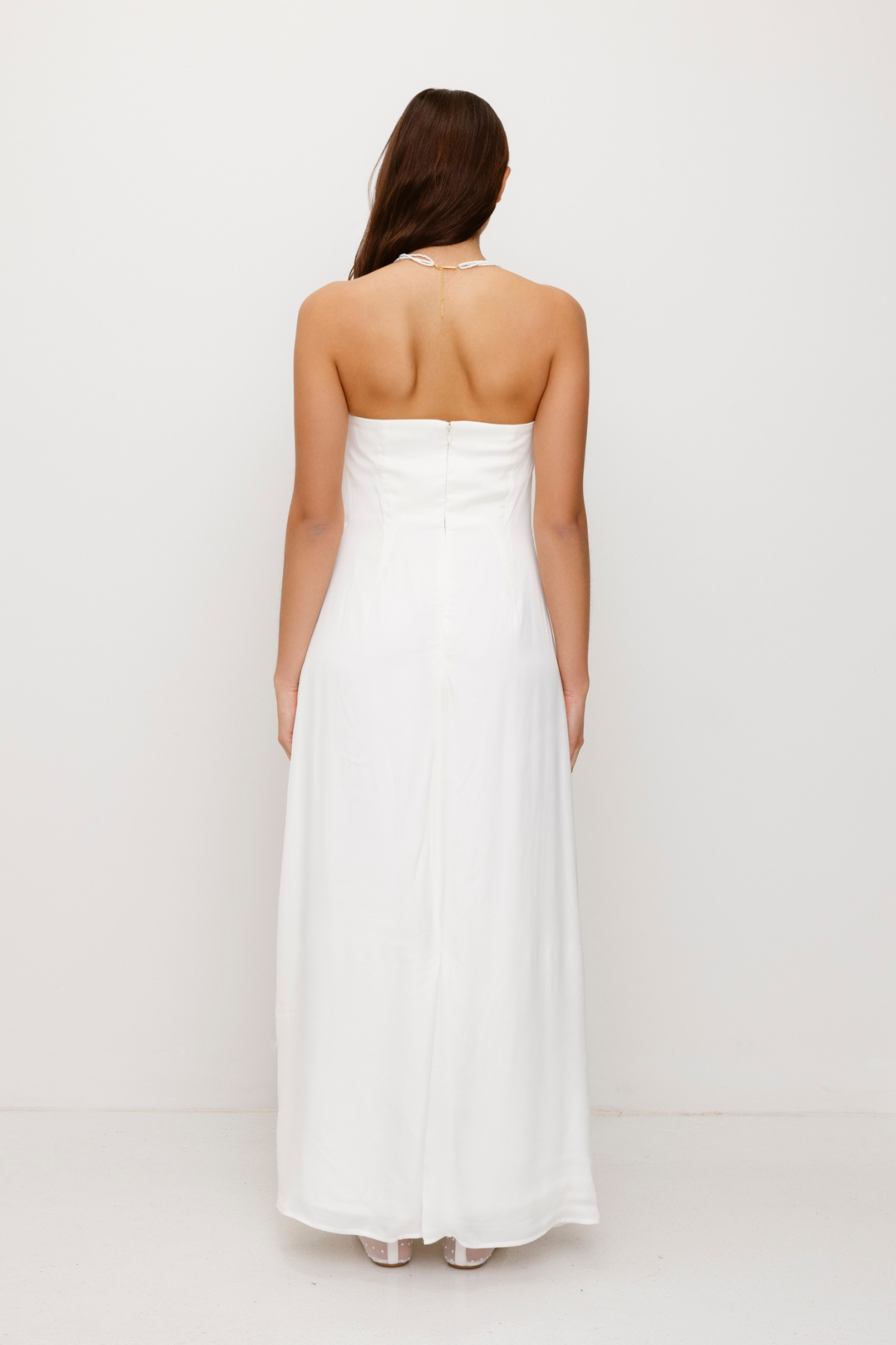 Women’s strapless White Kora Maxi Dress with asymmetric cowl neckline, abstract print, and invisible zip—perfect for events or long lunches.