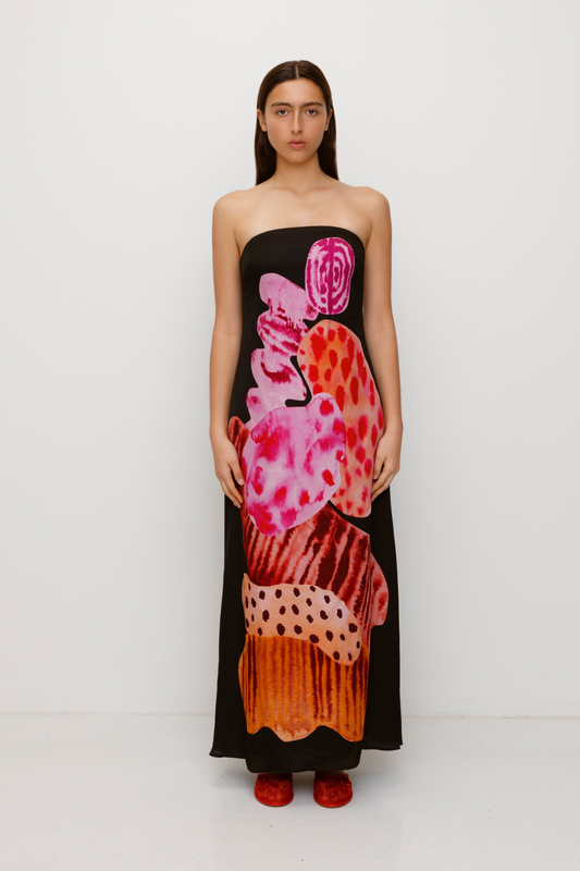 Women’s strapless Black Noir Kora Maxi Dress with asymmetric cowl neckline, abstract print, and invisible zip—perfect for events or long lunches.