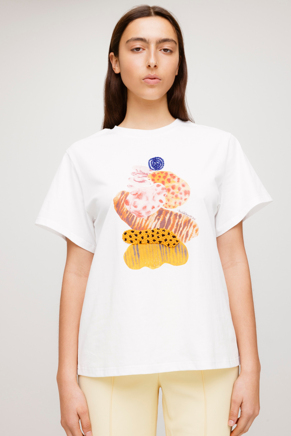 Women’s White Kora T-Shirt in 100 percent cotton with abstract TWG graphic beaded 3D embroidery and easy relaxed fit for everyday wear.