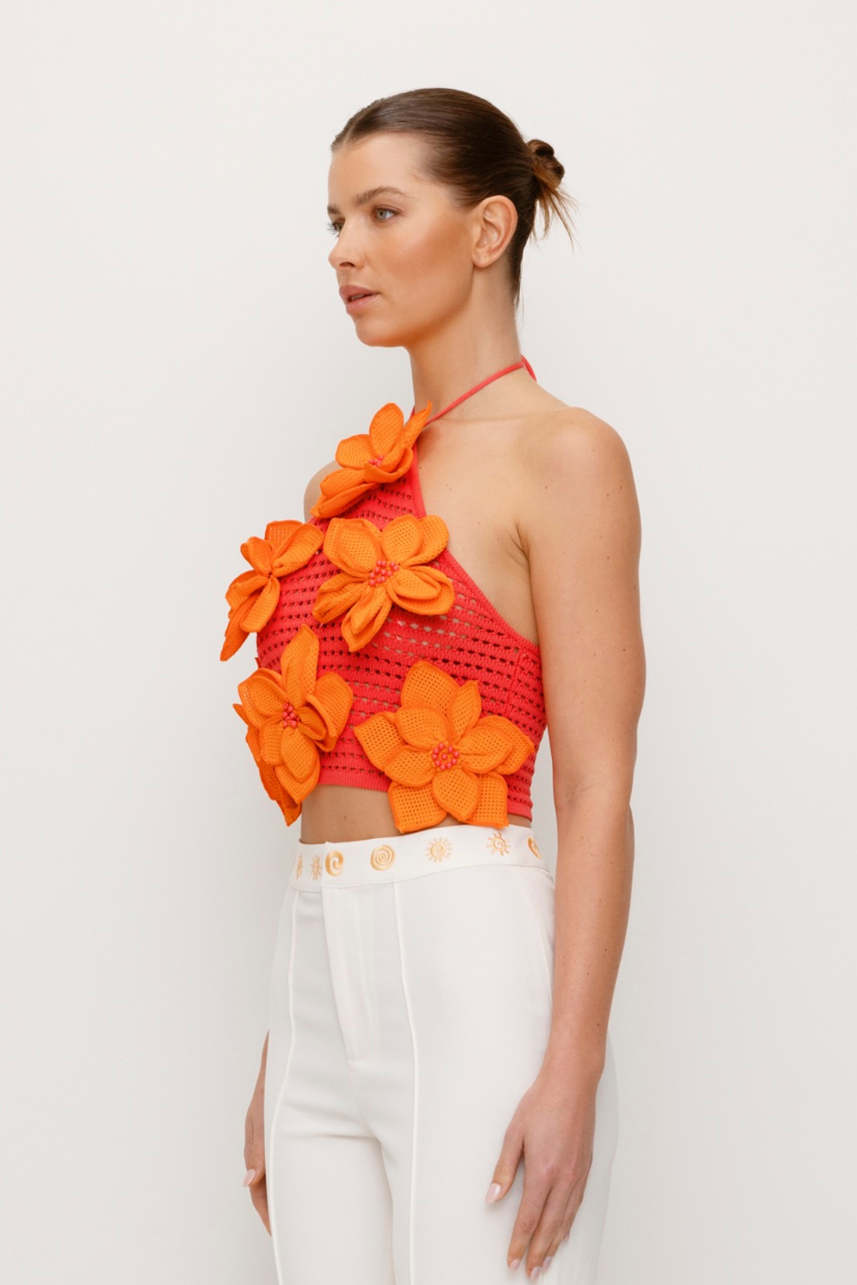 Women’s Pink & Orange La Monada Knit Top with 3D crocheted flower embellishments halter neckline open weave and full coverage body-hugging fit