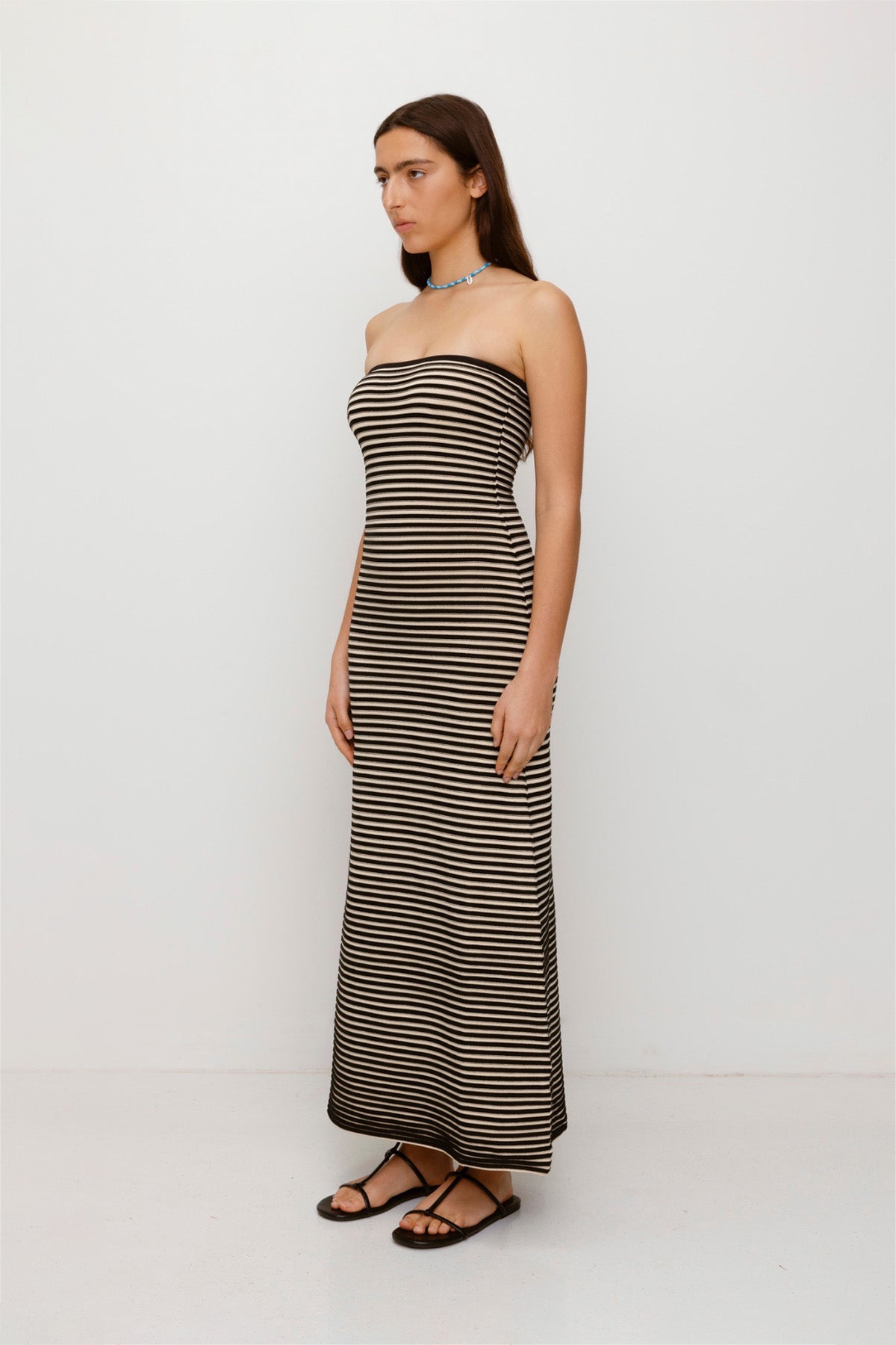 Black & White strapless tonal stripe knit maxi dress with body-con fit, perfect for maternity or event wear.