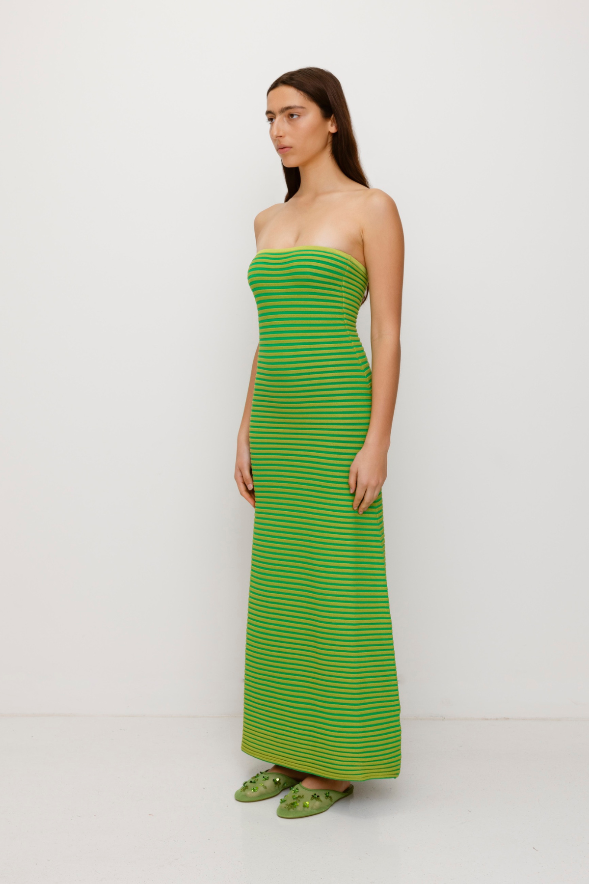 Lime green strapless tonal stripe knit maxi dress with body-con fit, perfect for maternity or event wear.