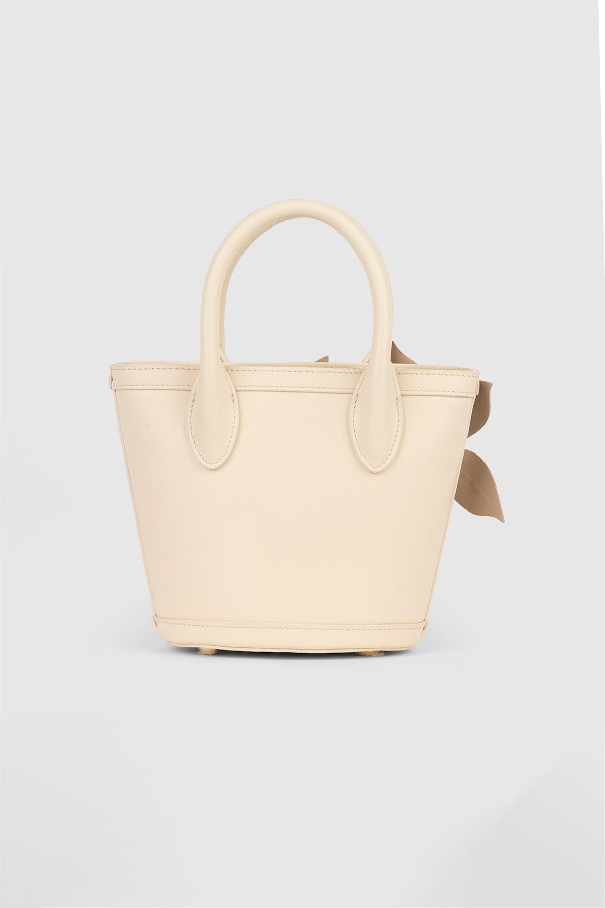 Womenās Cream La Monada Flower Bag in structured leather with floral embellishments dual top handles and crossbody option for day to night wear