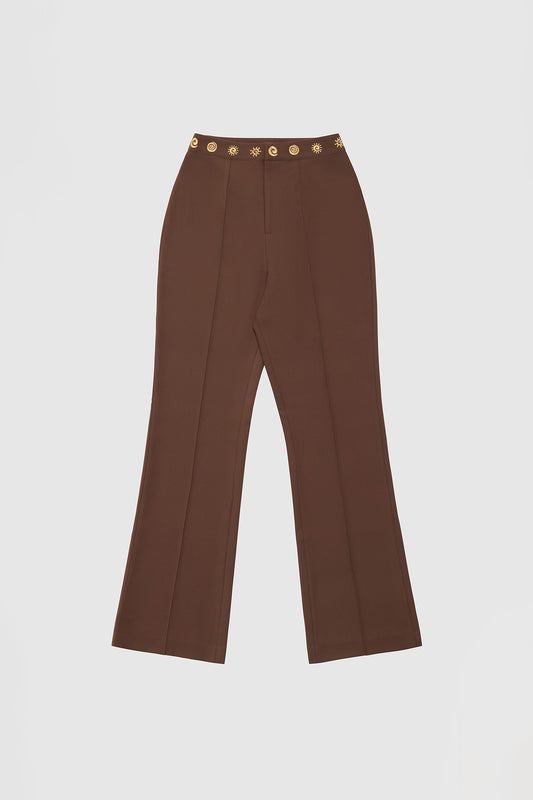 Women’s highwaisted Chocolate Brown Irida Bootcut Pants with pin tuck detail and embroidered waistband—wear solo or as a matching set with Irida Vest Dress.