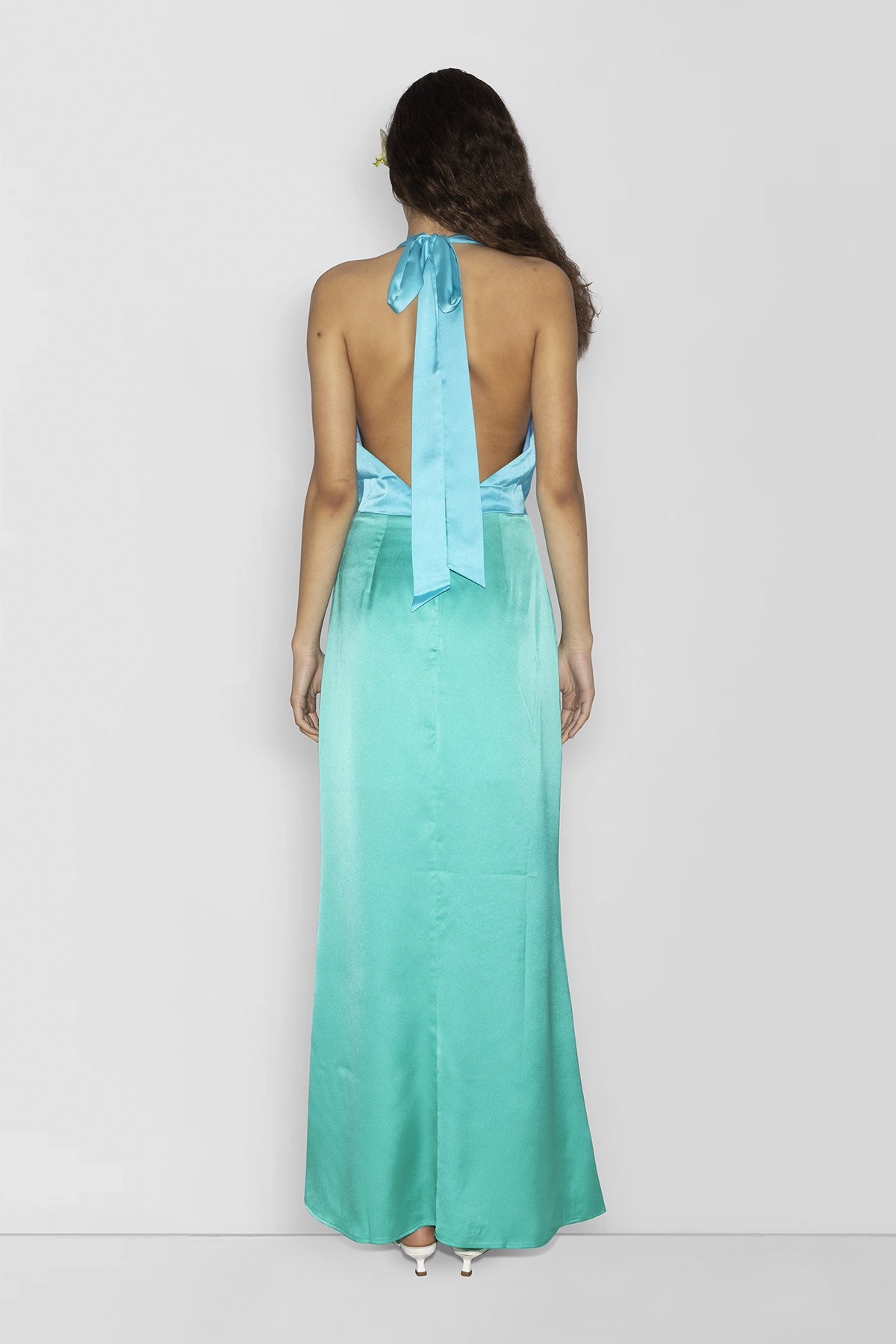 Elegant blue satin bridesmaid slip dress with adjustable tie neck and contrast bodice.