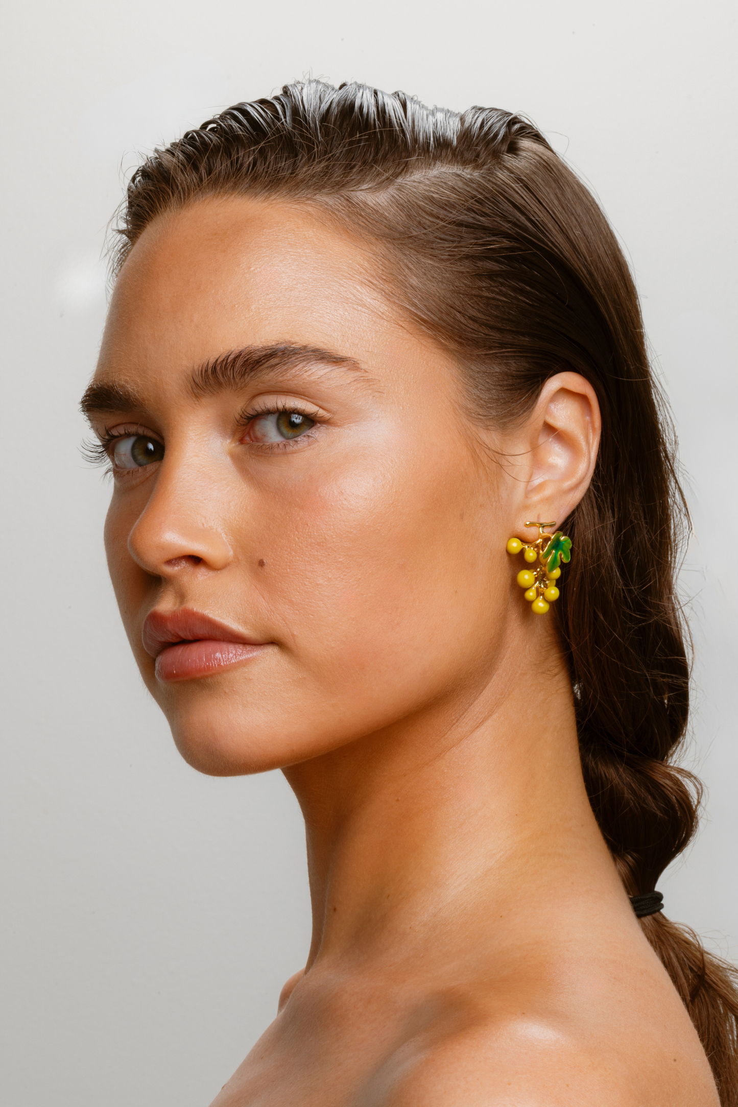 Women’s yellow statement earrings with clustered grape-like design and polished finish perfect for playful daytime or evening looks.