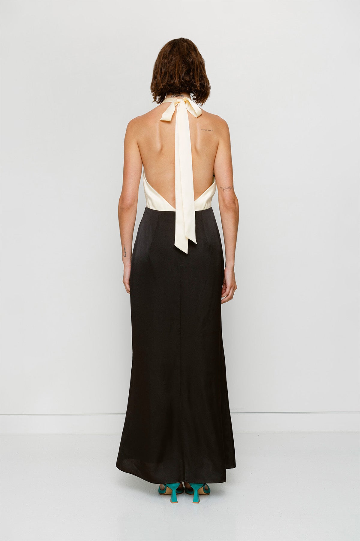 Elegant Black & White satin bridesmaid slip dress with adjustable tie neck and contrast bodice.
