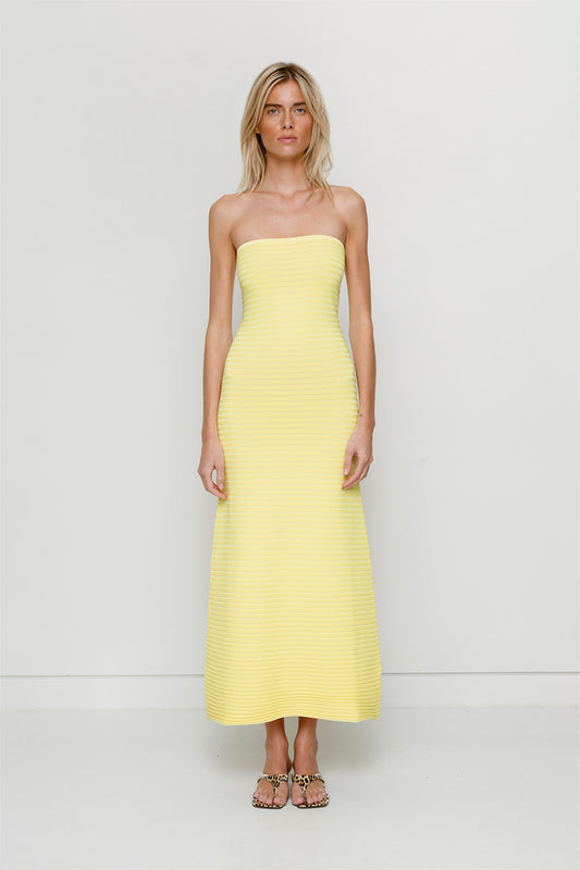 Yellow strapless tonal stripe knit maxi dress with body-con fit, perfect for maternity or event wear.