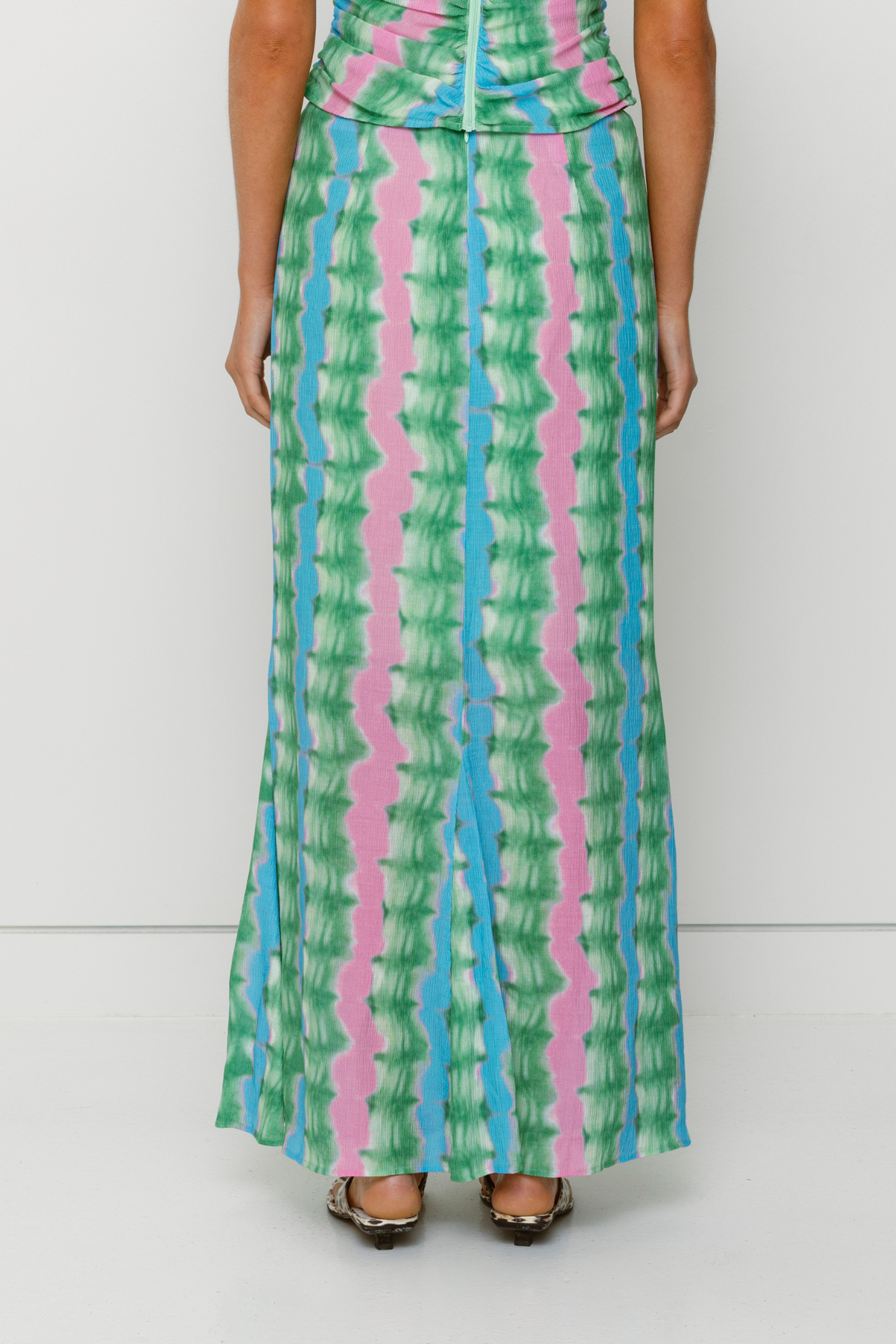 Women's tie-dye maxi skirt by The Wolf Gang, styled to match the ruched Catia Top for an effortless coordinated outfit.