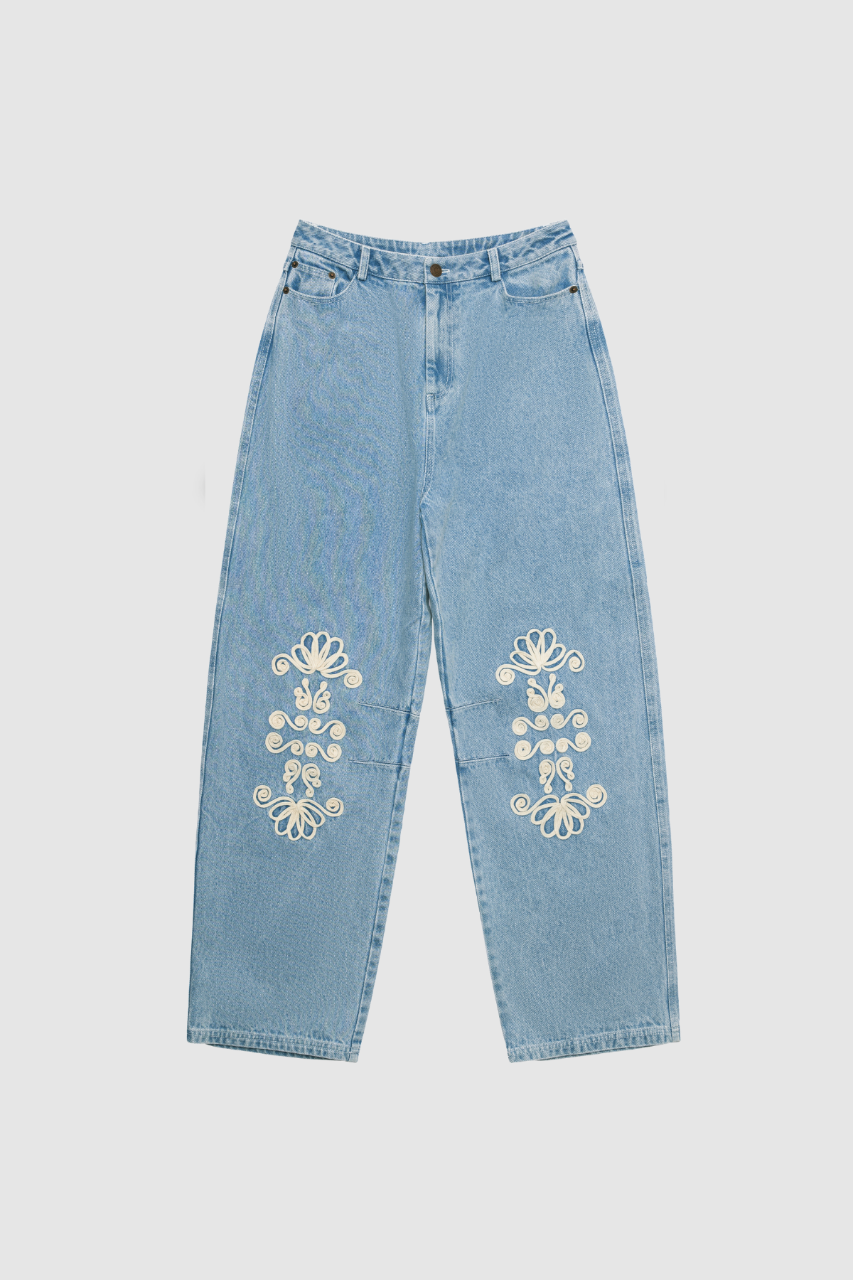 Vintage-inspired mid-rise barrel denim jeans with custom TWG embroidery and functional pockets, 100% cotton.