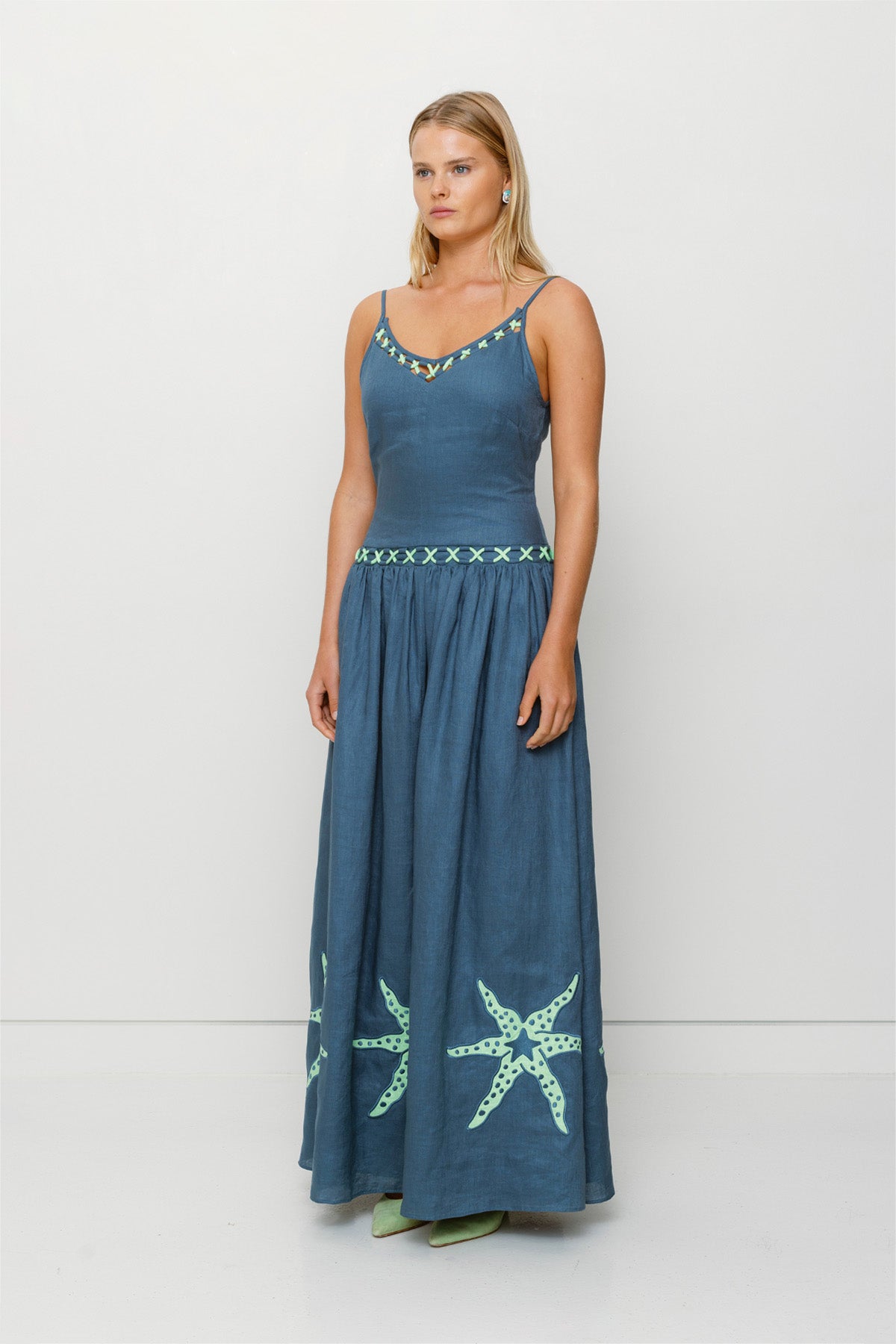 Women's stone blue cotton maxi dress with roped neckline by The Wolf Gang, elegant and versatile for day or evening wear.
