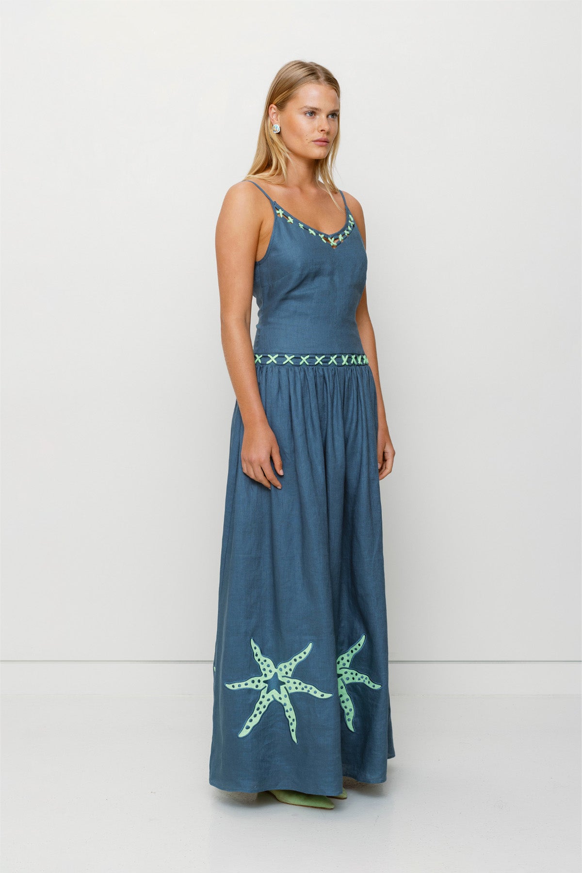 Women's stone blue cotton maxi dress with roped neckline by The Wolf Gang, elegant and versatile for day or evening wear.