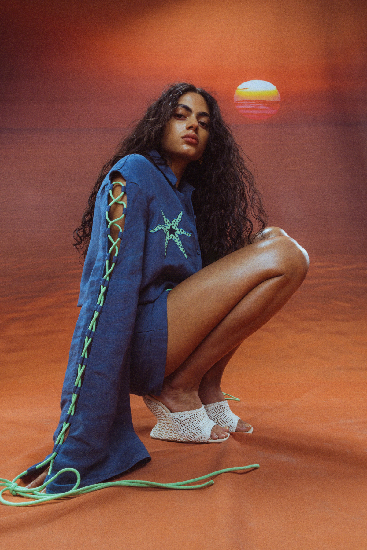 Women's long sleeve mini dress with roped detail and embroidered starfish by The Wolf Gang, perfect for day to night wear.