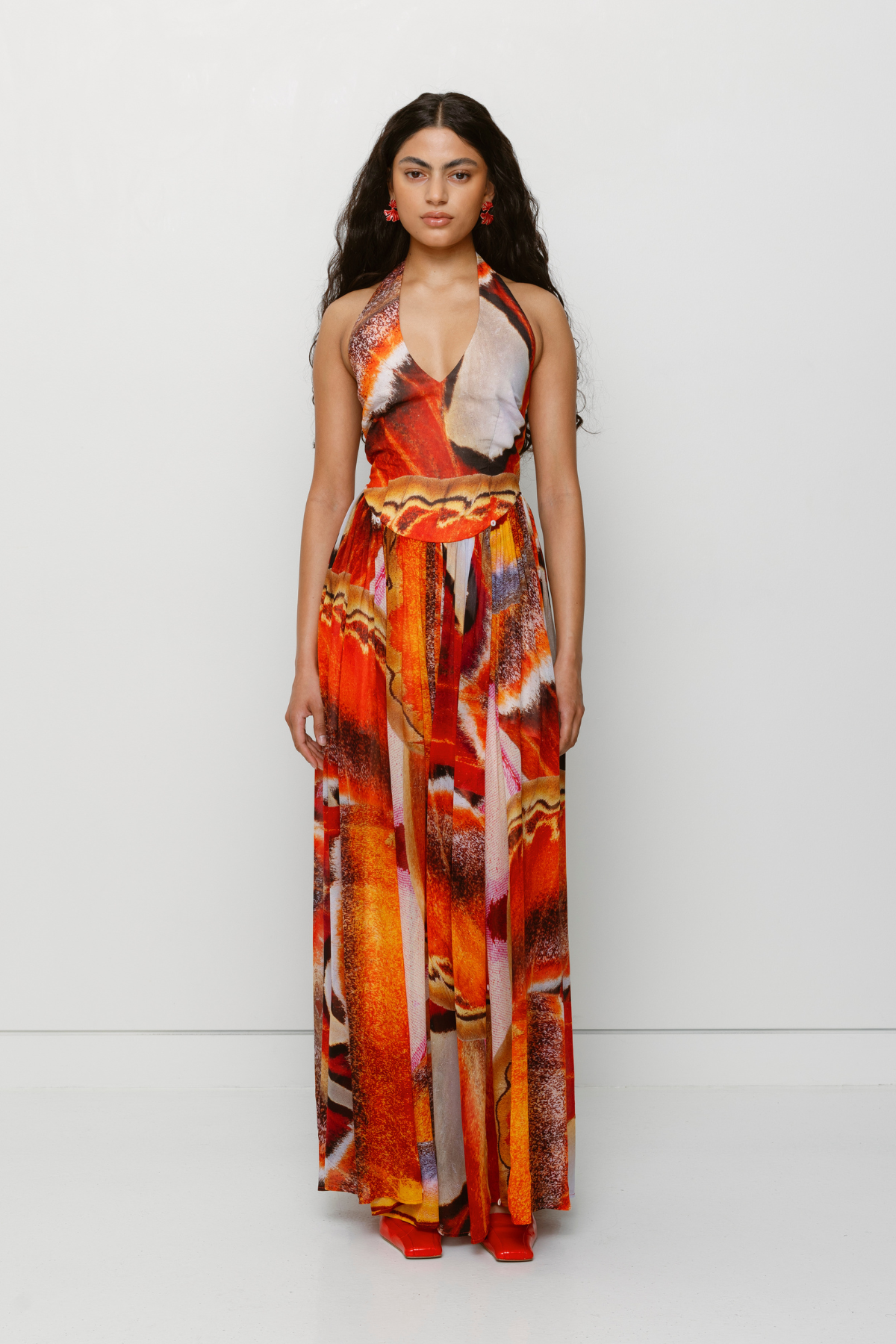 Versatile sheer Rumi Maxi Dress with adjustable skirt buttons by The Wolf Gang, customizable length for day or night wear.