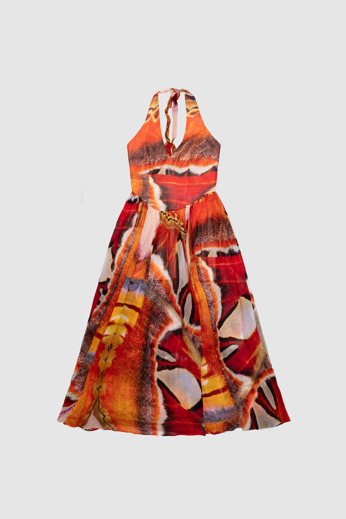 Versatile sheer Rumi Maxi Dress with adjustable skirt buttons by The Wolf Gang, customizable length for day or night wear.