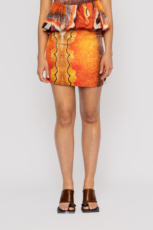 Orange multi-color linen mini skirt by The Wolf Gang, in custom TWG print, designed to pair with the Rumi Halterneck Top.