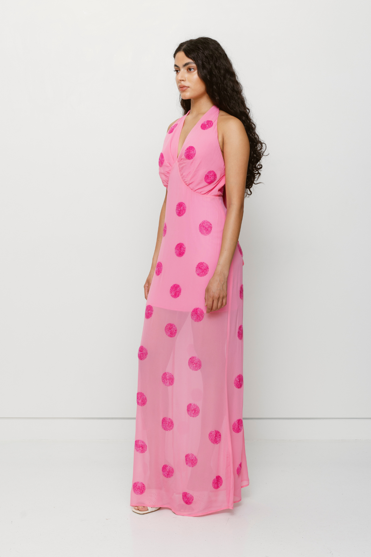 Beaded halterneck viscose slip dress with custom fabric and back zipper by The Wolf Gang, perfect for weddings and special events.