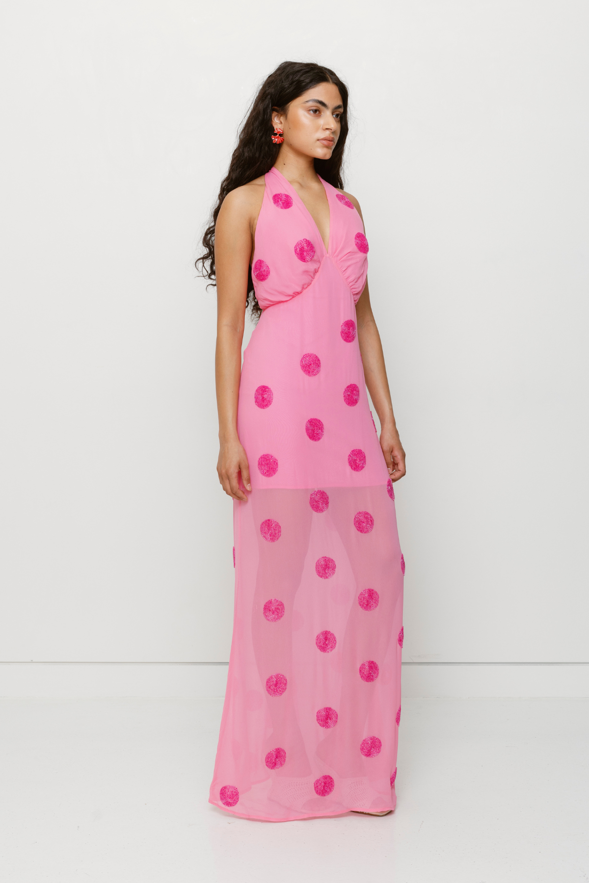 Beaded halterneck viscose slip dress with custom fabric and back zipper by The Wolf Gang, perfect for weddings and special events.