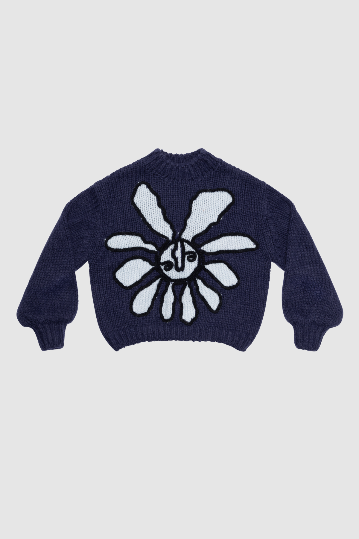 Cozy wool blend bell sleeve knit sweater with relaxed fit and custom TWG pattern, perfect for stylish winter layering.