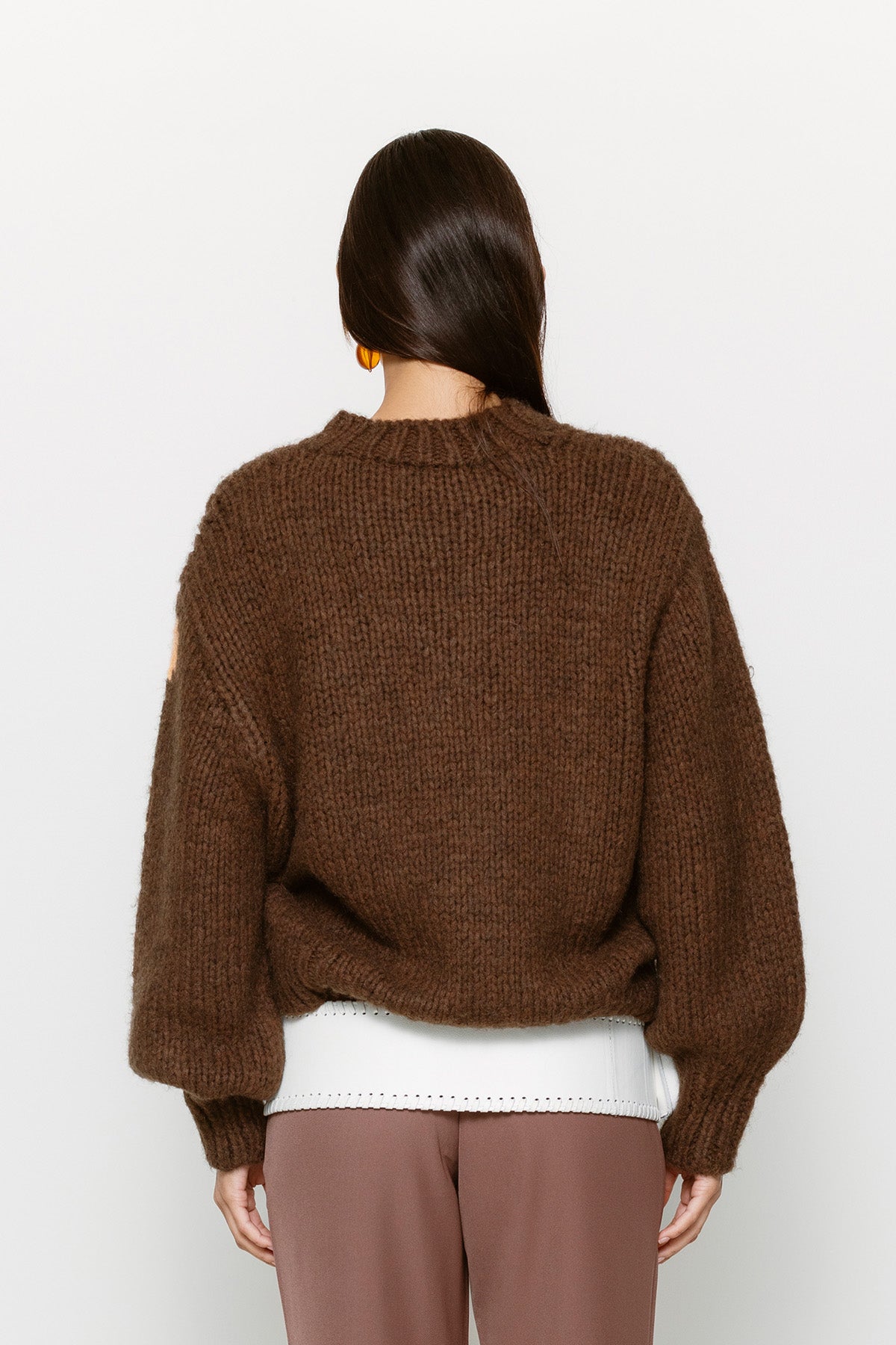 Relaxed fit women’s knit jumper in earthy brown with custom sun motif
