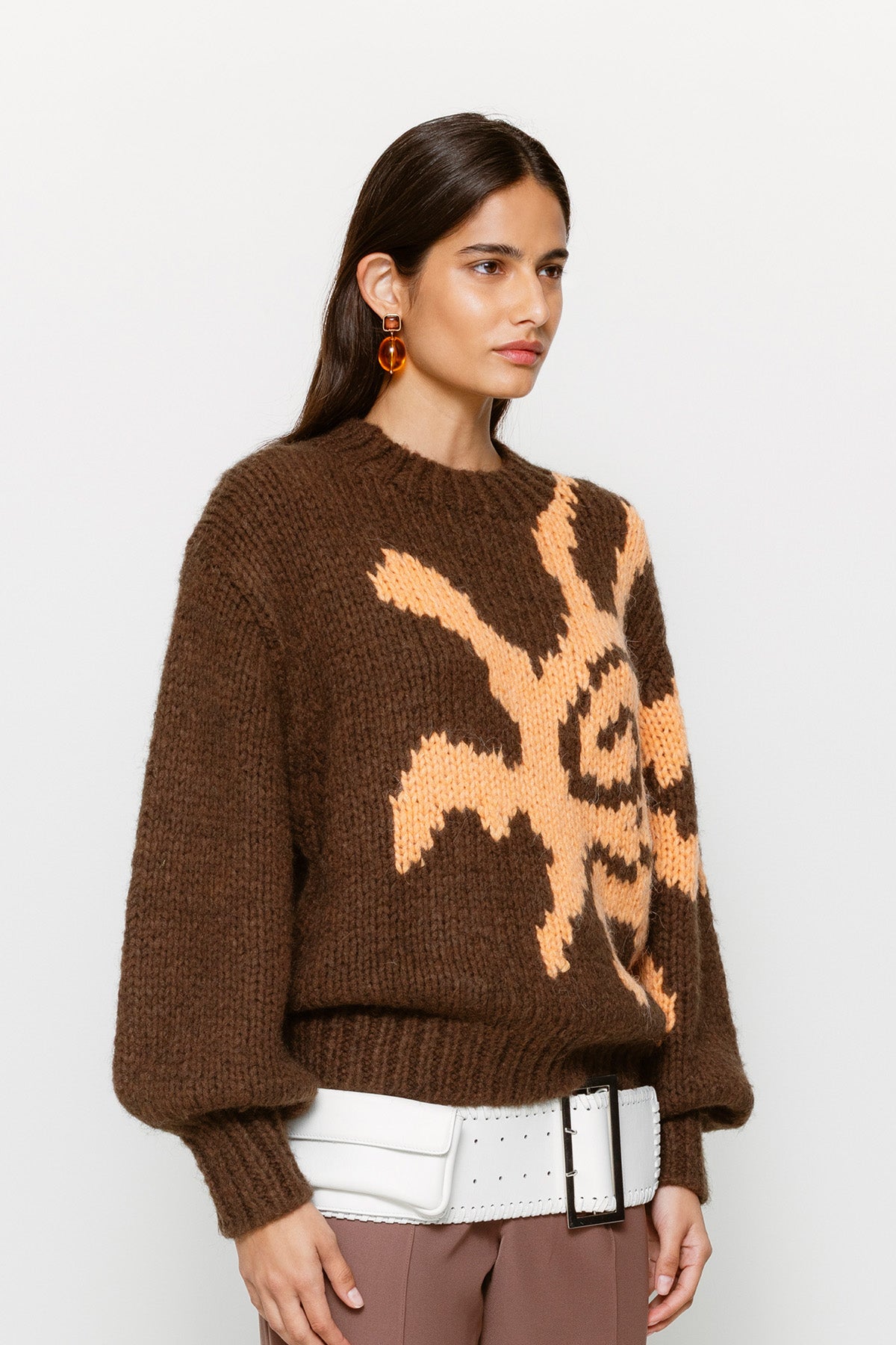 Relaxed fit women’s knit jumper in earthy brown with custom sun motif