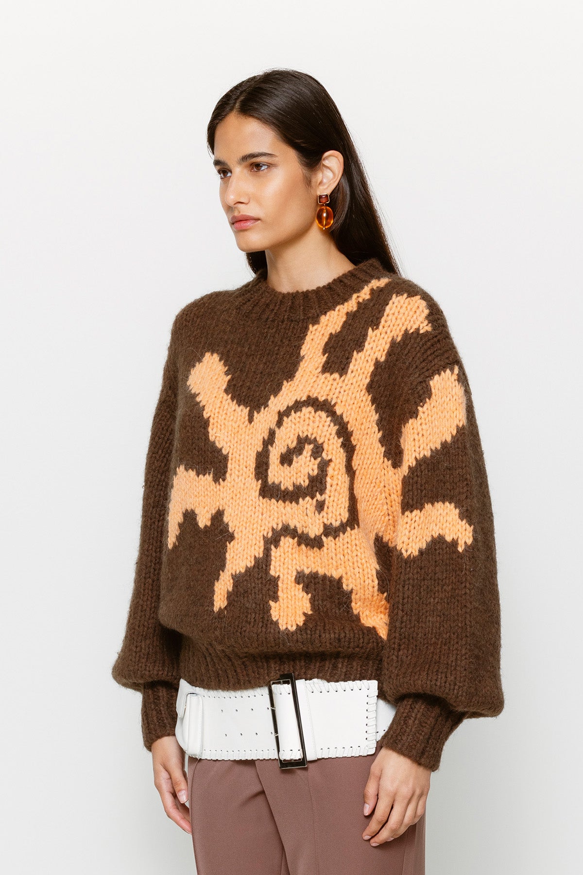 Relaxed fit women’s knit jumper in earthy brown with custom sun motif