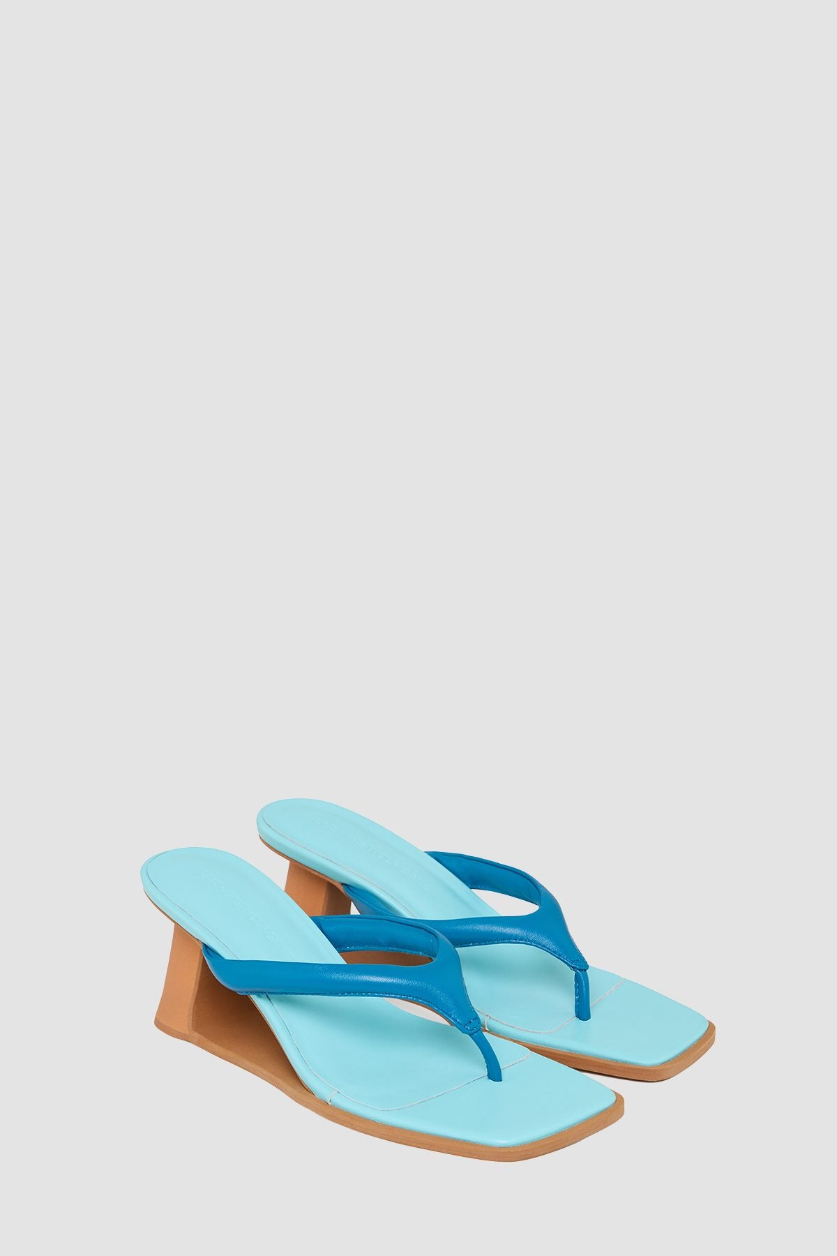 Allegra Heel in Blue by The Wolf Gang β front three-quarter view of the pair