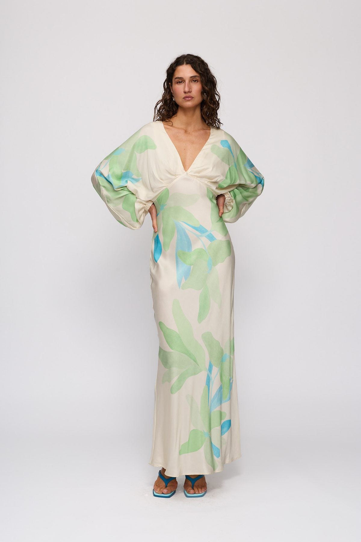 Concha Maxi Dress in Ocean Lily by The Wolf Gang – front view, hands on hips
