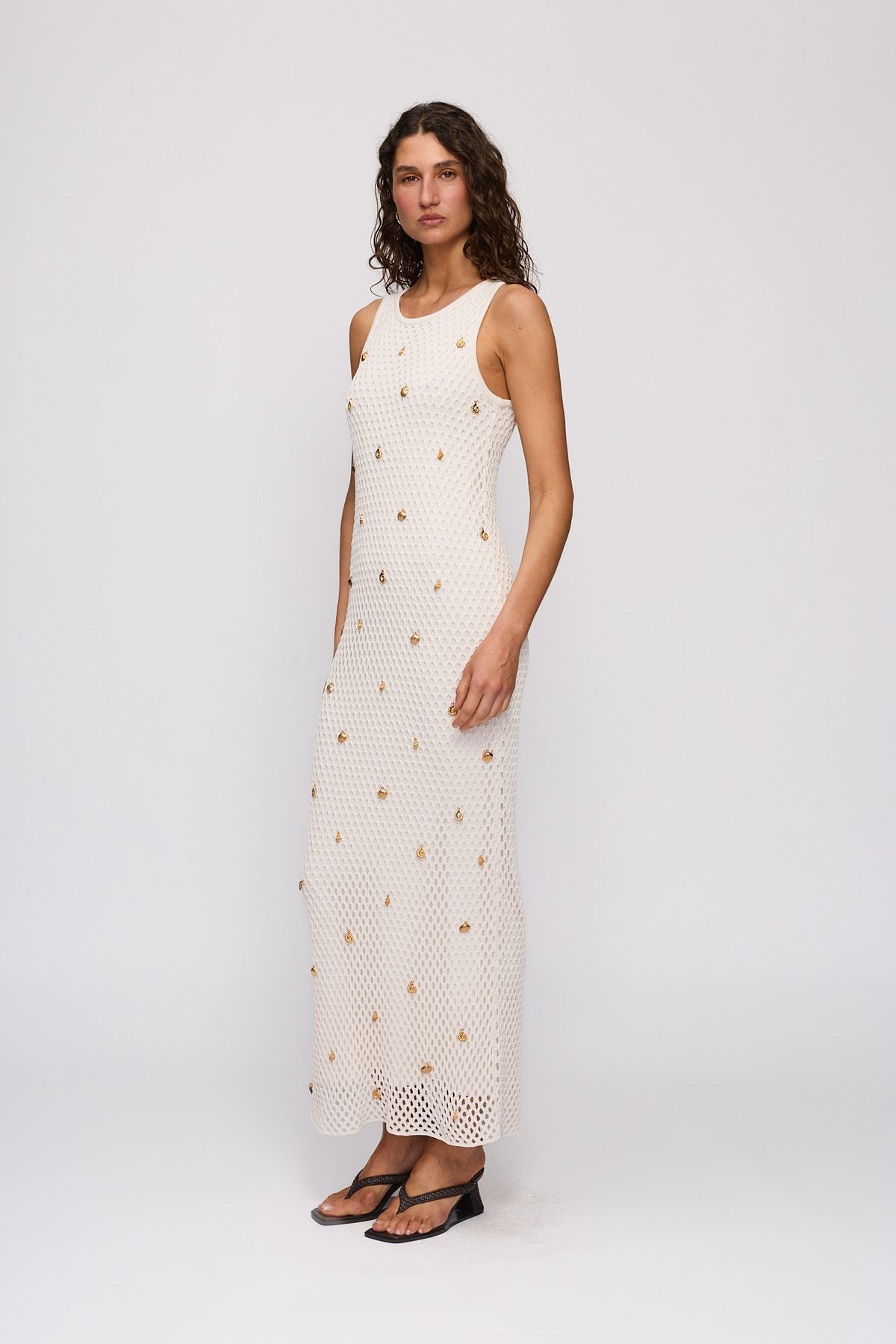 El Calo Maxi Dress in Ivory by The Wolf Gang – three-quarter side view