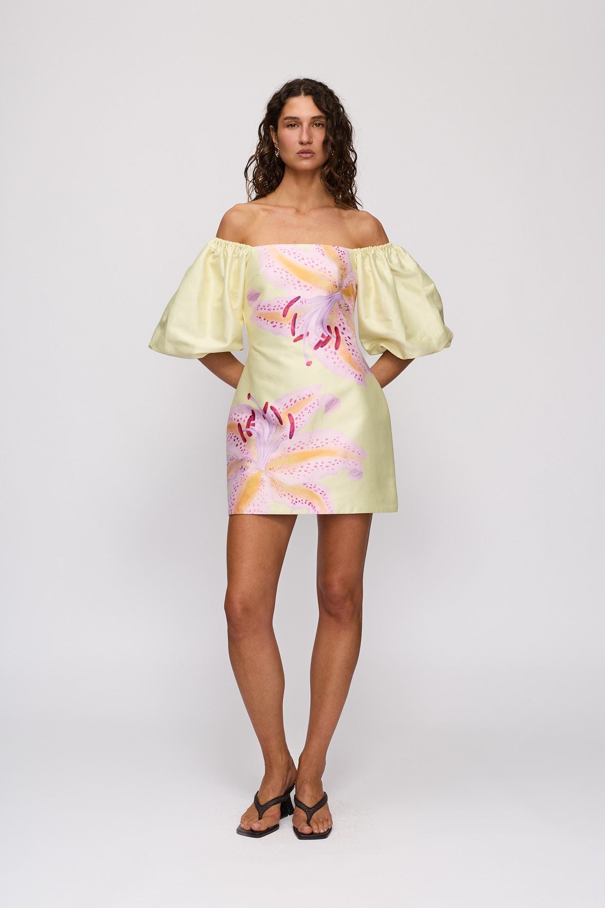 Elda Mini Dress in Candy Hibiscus by The Wolf Gang – front view, hands on hips