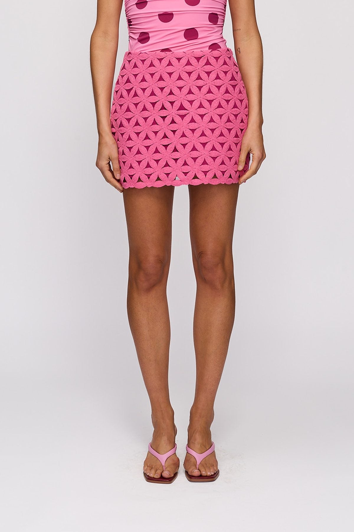Leilo Mini Skirt in Berry by The Wolf Gang โ front close-up of skirt