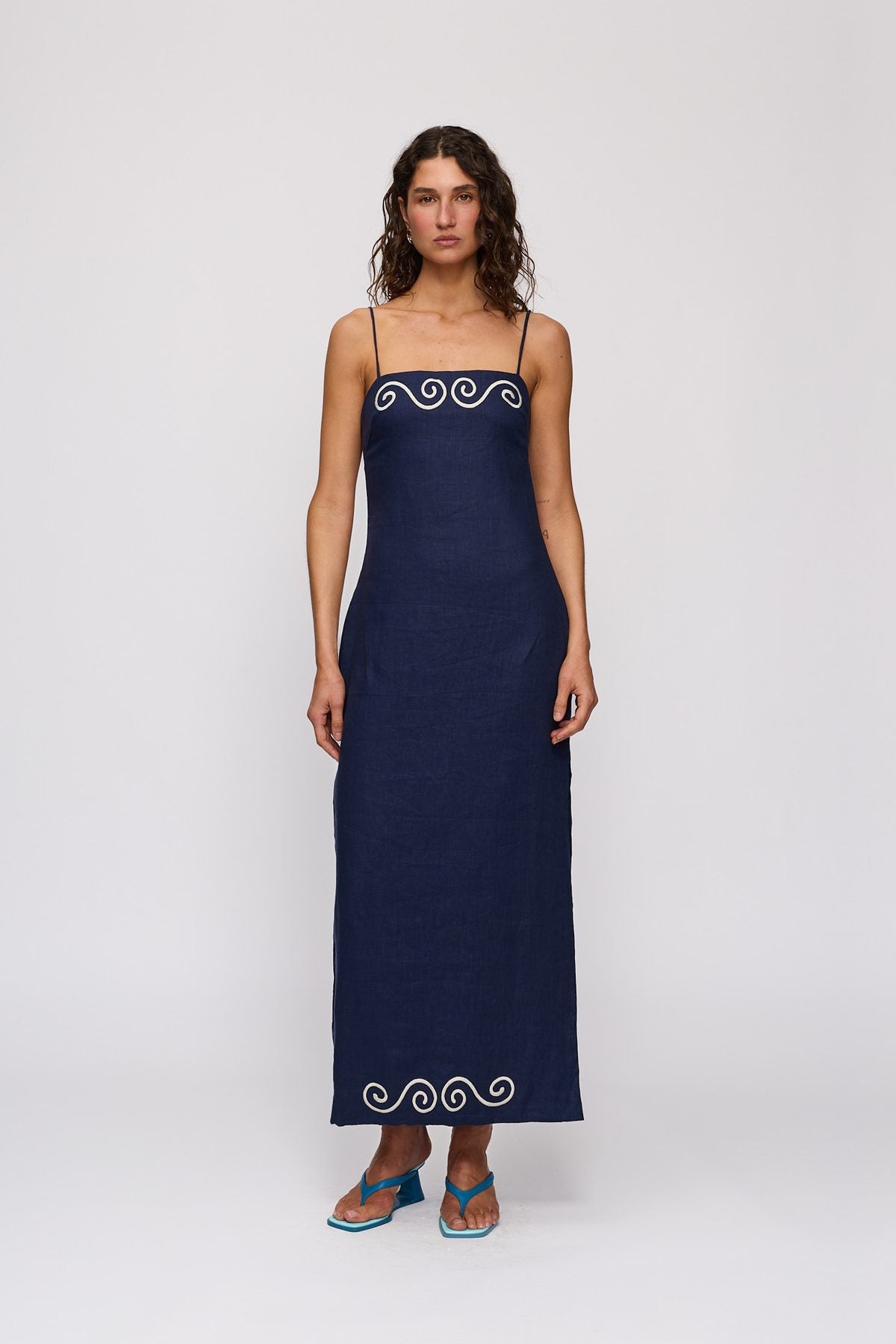 Seren Midi Dress in Navy by The Wolf Gang – full-length view