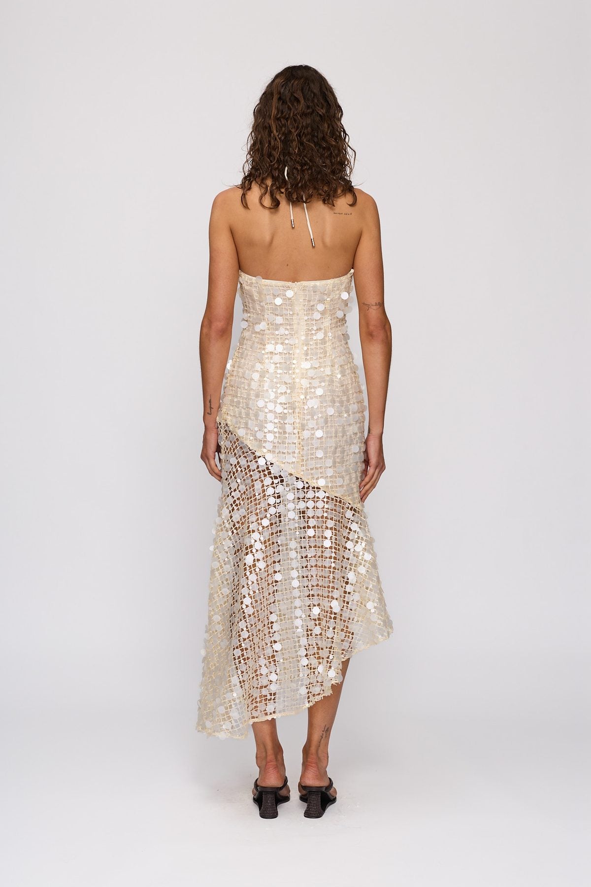 Sondra Maxi Dress in Champagne by The Wolf Gang – back view showing halter tie and open back