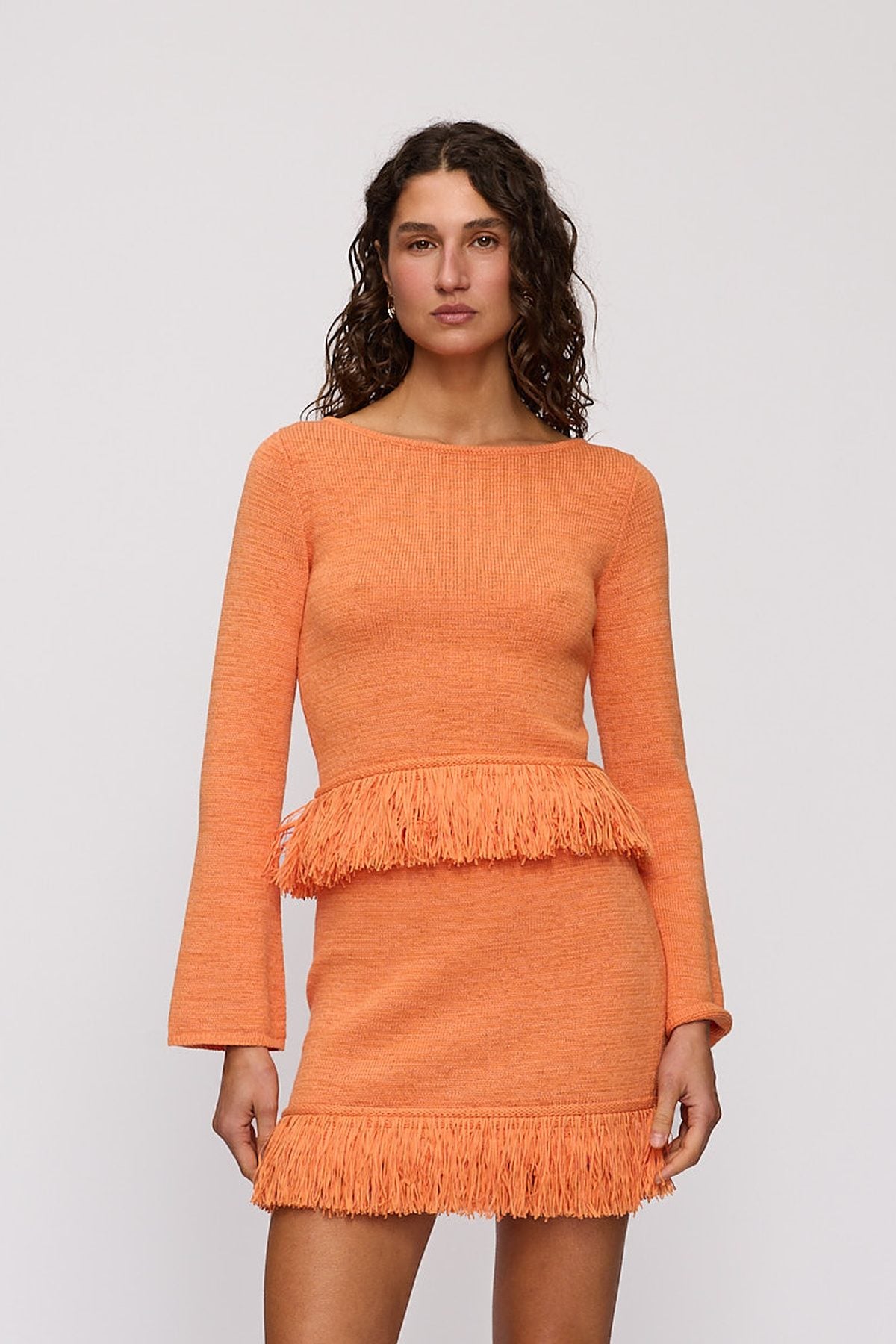 Tully Long Sleeve in Tangerine by The Wolf Gang – close-up view