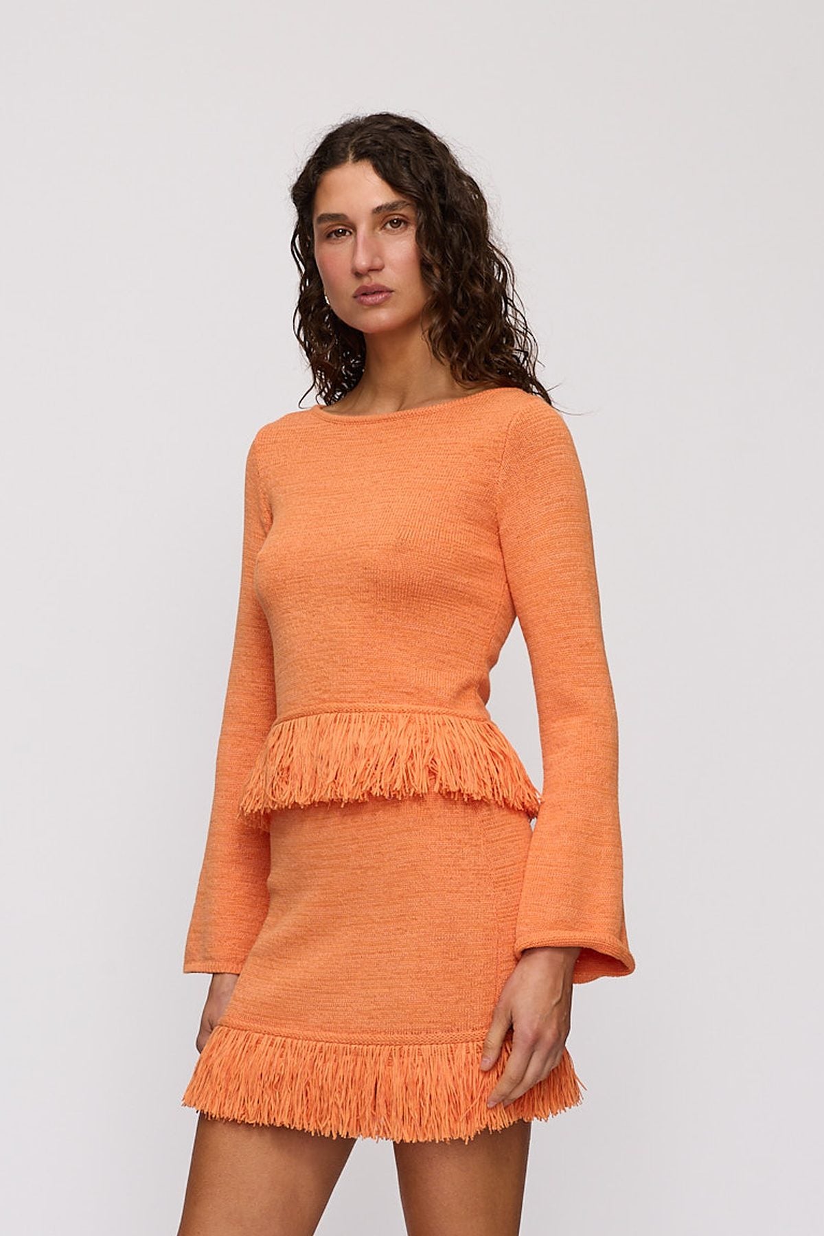 Tully Long Sleeve in Tangerine by The Wolf Gang – close-up view